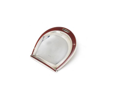 A German silver and enamel 'stirrup' ashtray or dishmaker's mark 'ASB', circa 1920 Shaped as a stirrup, the red enamel border