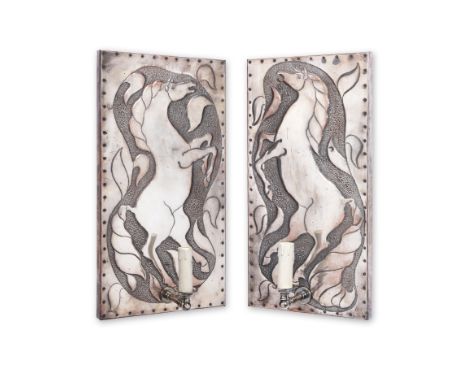 Two similar 1970's silvered metal wall appliquesthe angular single arms issuing from nailed repousse rectangular backplates d