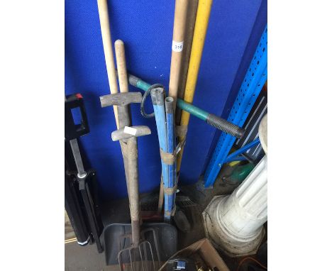 Two bundles of garden tools 