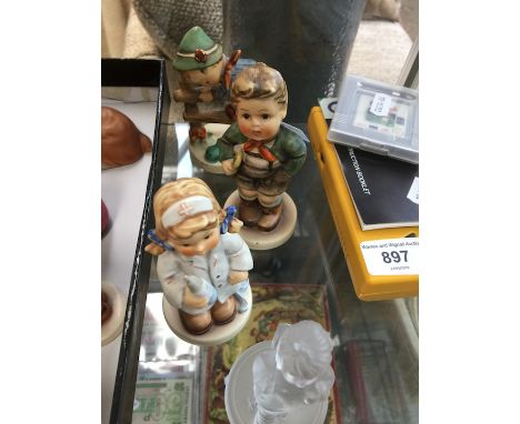 4 Hummel Goebel figurines to include a pressed glass example 