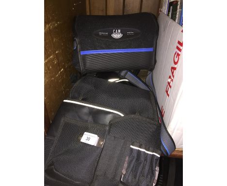 A JCB tool belt with various accessories pockets and a Cam Plus+ camera bag 