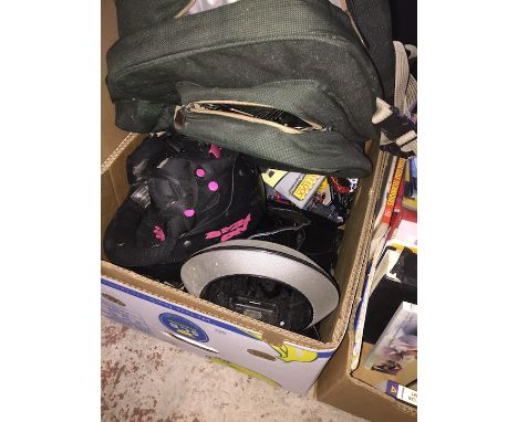 A box including a helmet, a JBL speaker, diecast toys etc. 