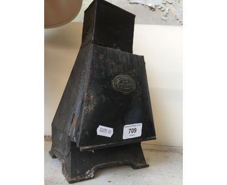 A vintage dark room lamp labelled 'Lancaster's Rubralux'. 