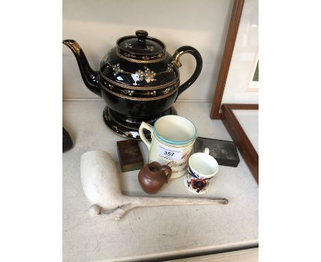 A mixed lot comprising a Victorian teapot and stand, other 19th century china, a clay pipe with football and boot etc. 