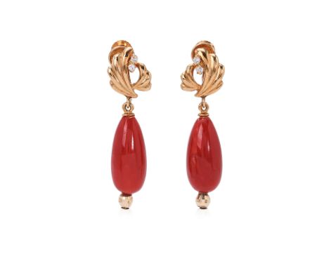 A PAIR OF RED CORAL AND DIAMOND SCREW BACK EARRINGS Featuring two red coral pieces mounted in a yellow gold setting marked 'K