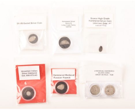 A group of four Medieval hammered silver coins, c.1028, and a Henry III half cut long cross penny, c.1247, two small unknown 