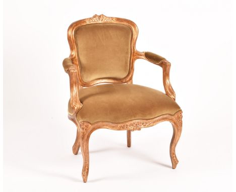 Christopher Guy. A fine quality gilded French fauteuil armchair, with upholstered back, seat and arms, with gilt frame and sc