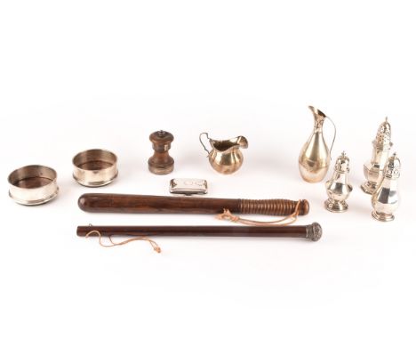 A collection of silver, including a Victorian silver cream jug, hallmarked for Birmingham 1899, three silver sugar sifters, a