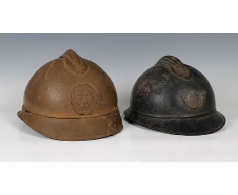 Belgium M-15 type Adrian Steel Helmet, with lion head badge, with liner, together with a French Adrian helmet with 'RF' bugle