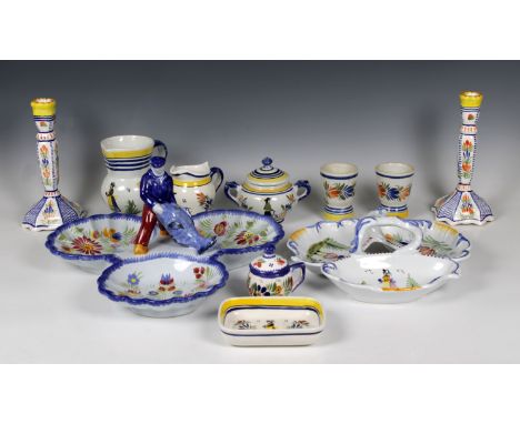 A large collection of French Faience glazed Quimper ware, early to late 20th century, the majority of pieces by Henroit, all 