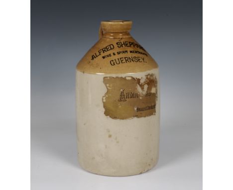 An Alfred Sheppard Ltd - Wine &amp; Spirit Merchants Guernsey Half Gallon Flagon, with paper label 'ARMAGNAC', by Price Brist