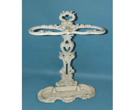 A painted cast iron two-division stick stand of scrolling foliate design, 64cm high. 