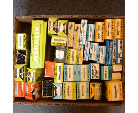A box of Marklin HO gauge model railway track, including turnouts, fully automated level crossing, and others, boxedQty: 1 bo