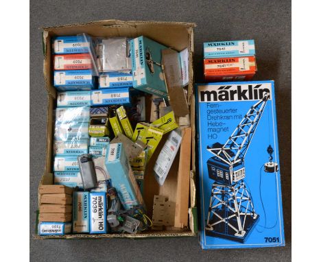 A tray of Marklin HO gauge model railway trackside lights, signals and others, including ref. 7051 remote controlled crane wi