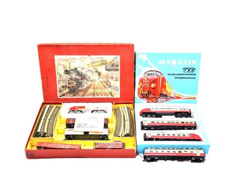 Marklin HO gauge model railway sets, including ref. 3070 TEE three-car set, central car warped, boxed; ref. 4070 TEE 1st clas