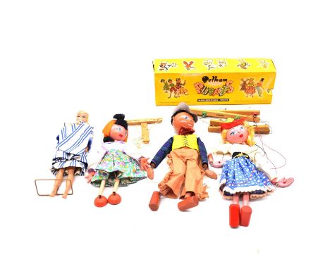 Three Pelham Puppets, including Cowboy, Cowgirl and girl in floral dress, with Mattel Barbie doll no.850, without original cl