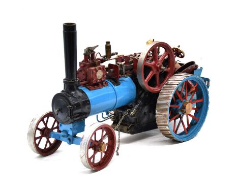 A scratch built live steam traction engine, built to the 'Minnie' design of L.C.Mason, cyan and maroon, length 46cm, height 3