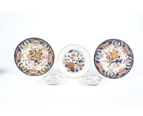 A pair of Derby plates in the Imari palette with gilt highlighting, the bases with further underglaze decoration and the hand