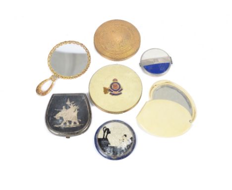 A collection of 20th Century compacts and hand mirrors, with enamel, printed, embroidered and etched decoration, including an