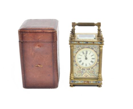 A 19th Century gilt brass and champleve enamel carriage clock, the architectural case with pilasters, enamel dial with Roman 