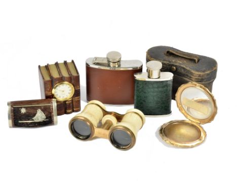 A pair of bone opera glasses, in a fitted leather case, three hip flasks, three Stratton powder compacts, a clock modelled as