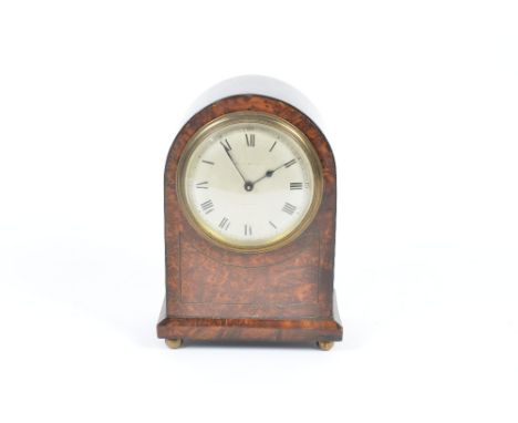 A 19th Century mantle clock, silvered dial with Roman numerals, inscribed 'Gill &amp; Reigate London', French movement, in a 