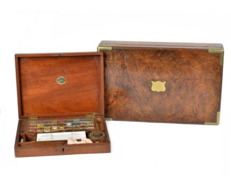 A vintage wooden watercolour box, titled 'The Students' Box of "Landseer" watercolours' including a ceramic mixing palette an