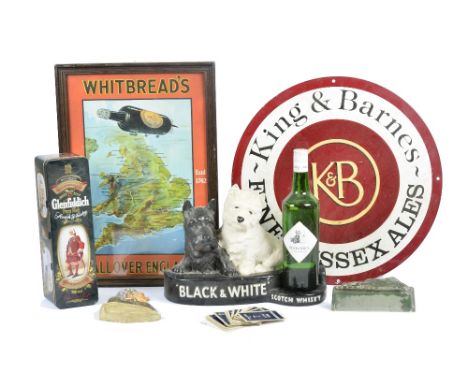 A selection of 20th Century alcohol related memorabilia, including a 1950s Whitbread's advertising poster, featuring a bottle