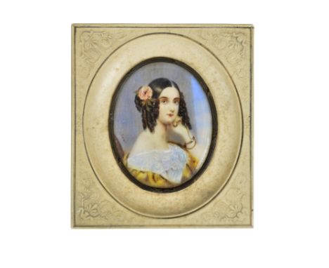 Attributed to Charles de Saar (Karl von Saar 1797-1853), a bust portrait of a girl, wearing a yellow dress and a flower in he