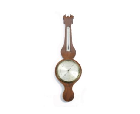 A Georgian mahogany and boxwood strung wheel barometer by L Barnascone Trowbridge, silvered dial with brass bezel, arched the