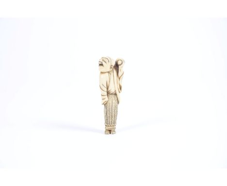 An 18th century Japanese carved ivory netsuke of Sennin, holding a bundle over his shoulder, unsigned, height 7.5 cm