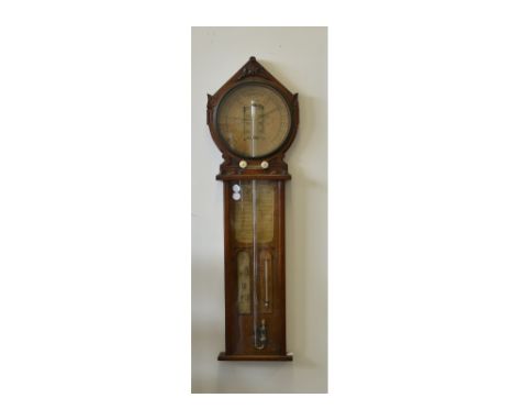 A Royal Polytechnic Barometer by Joseph Davis &amp; Co Fitzroy Works, the oak case with an arched surmount, above a glazed ci