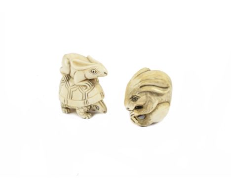 Two early 20th Century Japanese ivory netsuke, one modelled as a hare riding a tortoise, the other as a seated rabbit (2)