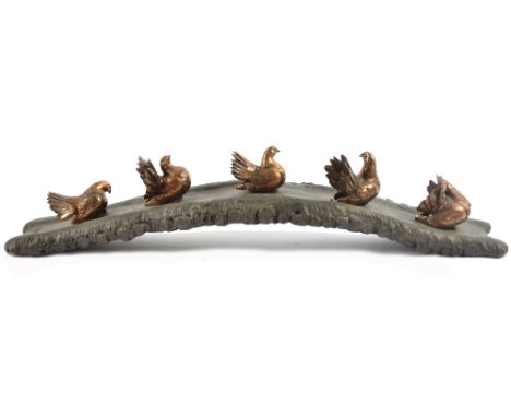 A 20th Century Chinese bronze and copper sculpture of five wing-tailed doves, naturalistic arched base, impressed character m