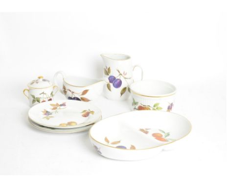 A selection of Royal Worcester Evesham, various pieces including, a fruit bowl, serving bowls, jugs, oil and vinegar, two div