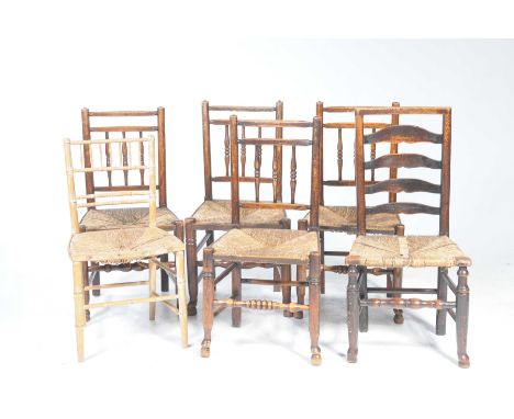 Four 18th/19th Century elm rush seat country chairs
Each with a rail back above three turned spindles over an envelope rush s