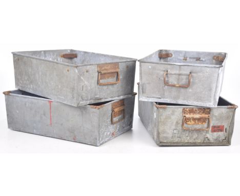A set of vintage galvanized metal tote tins
Each of the stackable rectangular metal tins with loop handles and old stickers a