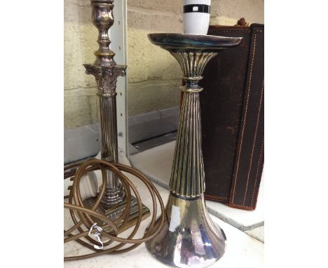 A silver plated Corinthian Column table lamp base together with a silver plated trumpet style table lamp.