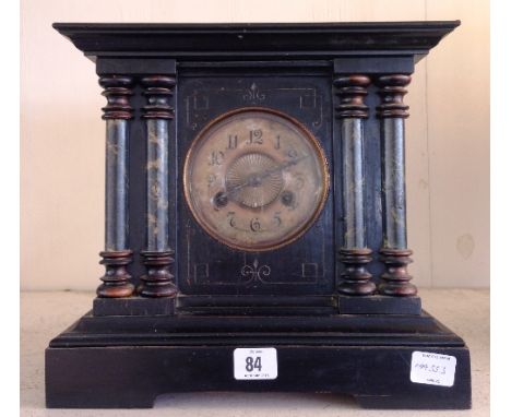 A late 19th century painted wood cased American style mantle clock.
