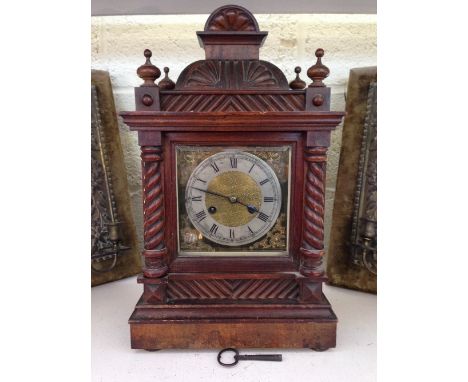 A Victorian oak cased mantle clock.