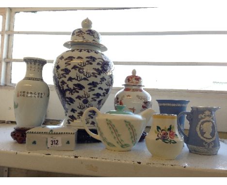 Three modern Chinese porcelain vases together with two Poole Pottery items, a Wedgwood vase and a Jasper Ware jug.