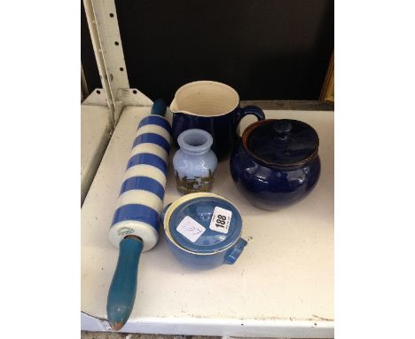 A T G Green blue and white banded rolling pin together with other kitchenalia.