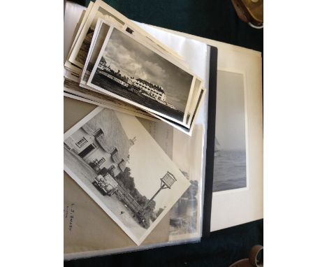 A box containing a collection of mid 20th century black and white photographs including Sailing and Yachting, local Sandbanks