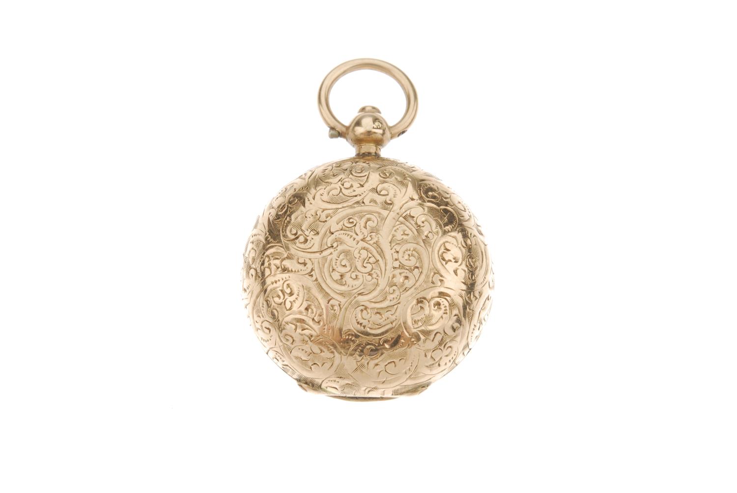 A late Victorian 9ct gold coin holder. The rounded circular holder