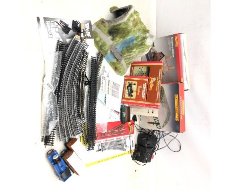 Hornby OO Gauge buildings and accessories comprising Country Station, R.334 Station Over Roof, R645 Single Track Level Crossi