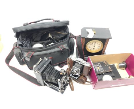 F. Deckel Munchen Compur folding camera fitted with Rada roll-film cassette, Wester Apollo 35mm camera, camera bag and quanti
