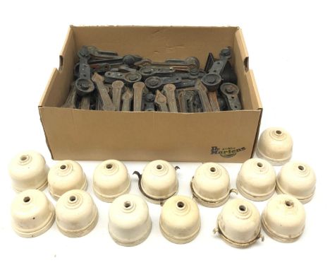 Collection of 63 Edwardian 'Dura' bronzed iron stair carpet clips and a qty. of ceramic ceiling light fittings  Condition Rep