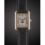 A GENTLEMAN'S SIZE 18K SOLID GOLD CARTIER TANK CALENDAR MOONPHASE WRIST WATCH CIRCA 1990s