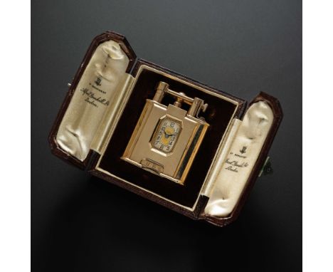 A RARE 9CT SOLID GOLD DUNHILL UNIQUE WATCH LIGHTERCIRCA 1930, WITH ORIGINAL FITTED DUNHILL BOXMovement: 15J, manual wind.Case