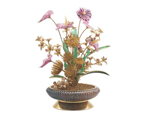 A SILVER GILT, DIAMOND &amp; RUBY SET&nbsp;OBJET D'ART IN THE DESIGN OF A SPRAWLING TROPICAL PLANT CIRCA 1980s The plant is m
